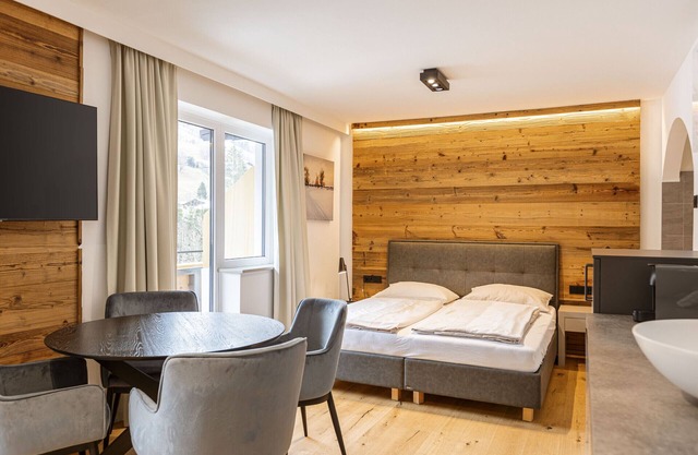 Juniorsuite for up to 4 people & wellness area