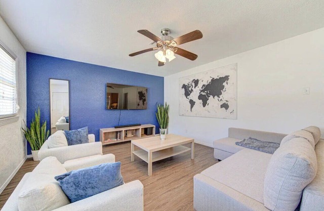 King bed with Pool table, decked patio and, gym.