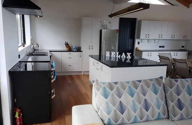 Kitchen and entertainment area with views and 3 pods for sleeping all separate