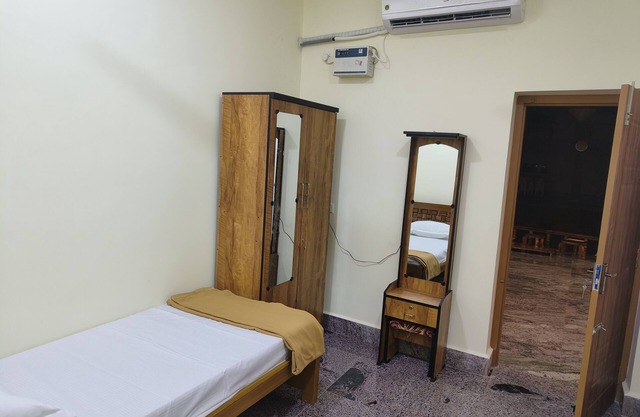 Ks rooms near by temple and giripradashan road car parking available