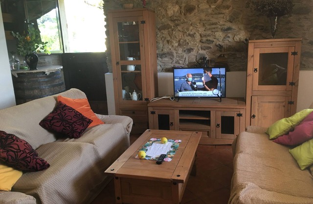 La Cabaña del Abuelo in the middle of a rural village and 5 minutes from the beaches.