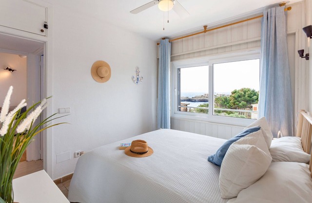 La Ola Beach House seaside holiday house with shared pool in Porto Colom.