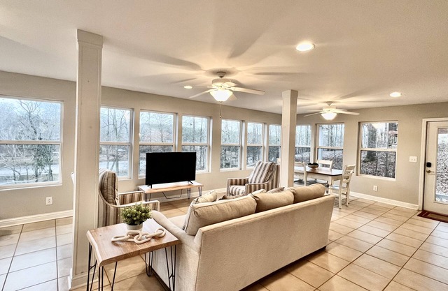 Lake front house near town and restaurants, paved road , year round water & dock