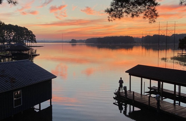 Lake Gaston Waterfront home with boat dock, fire pit, and views