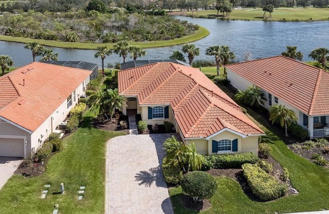 Lake, Golf, and Pool Views with First-Class Amenities!