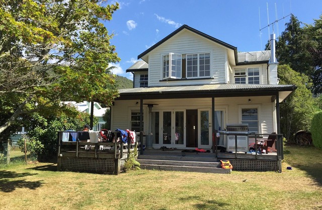 Lake Rotoiti LAKEFRONT home with jetty, boat ramp, parking & many extras!