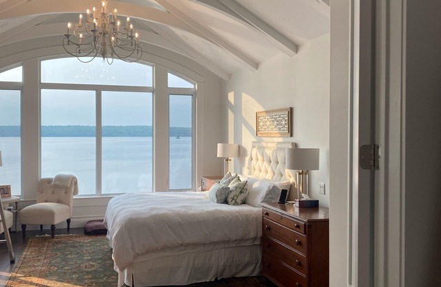 Lake side Chateau and Coach House with private beach and Hot Tubs.