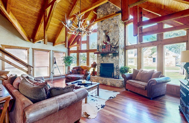 Lake view home with expansive yard, lovely porch & nearby lake access