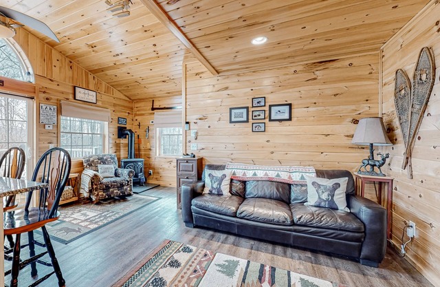 Lake-view two-story home with beach access, wood stove, grill, W/D, & fast WiFi