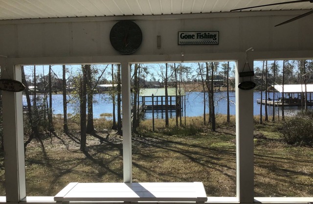 Lakefront beauty with boat lift.