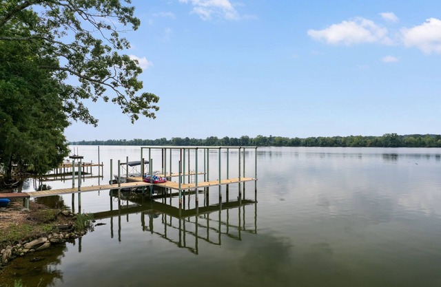 Lakefront Cottage with Boat Slip and Paddleboat
