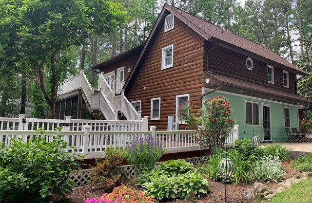 Lakefront Cottages -Sleeps 17 Shared sandy beach and dock area