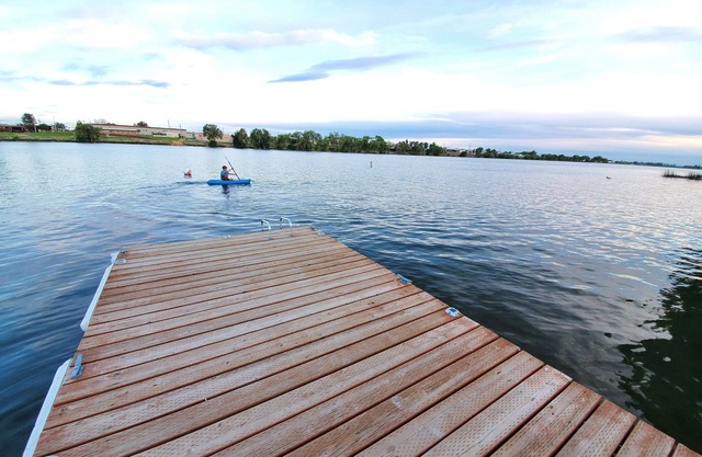 Lakefront Getaway. Private Waterfront Home with Dock and Sunroom.
