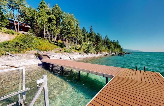 Lakefront getaway with dock, 400- square-foot deck, close to town