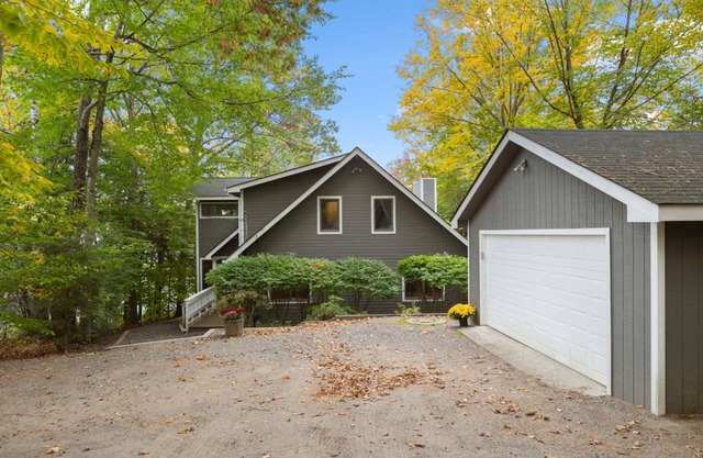 Lakefront home on the lake with game room, private beach, and boat dock
