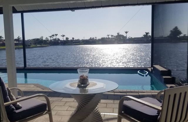 Lakefront Luxury Paradise: 80ft Waterfront, Private Pier & Heated Pool Oasis!