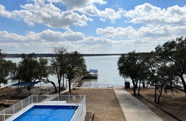 Lakefront Retreat with Pool, on site Private Boat Ramp and 2 slip dock.