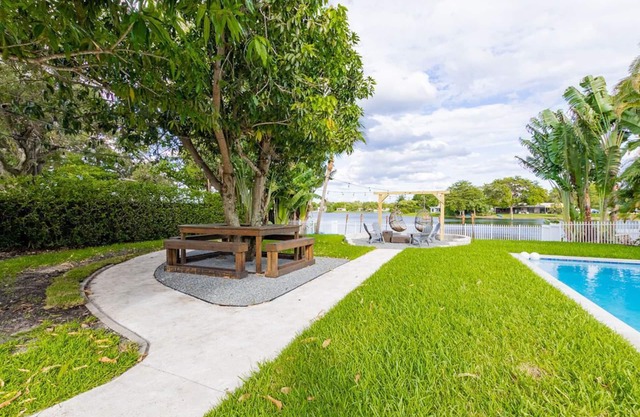 Lakefront Villa | Tropical Backyard w/a Terrace+Paddle Board+Pool