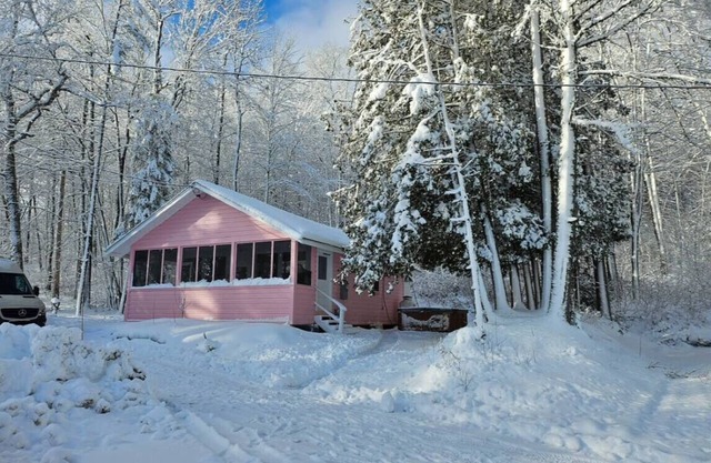Lakefront vintage pink house