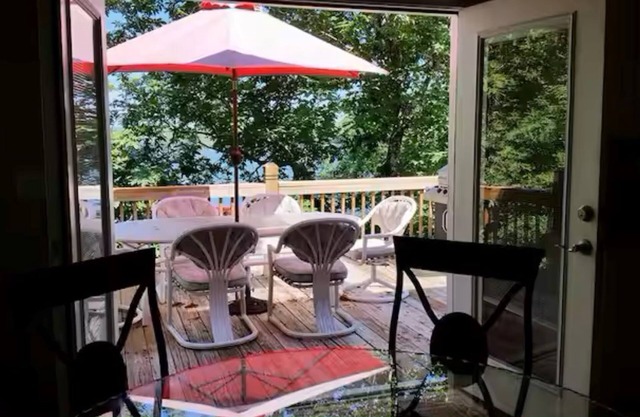 Lakehouse nestled in the treetops with beautiful lake views.