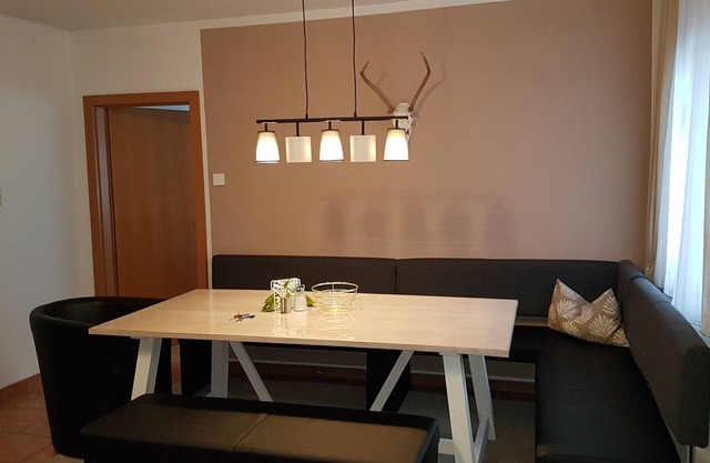 Large 125m² apartment with balcony and fireplace for 6 to 12 people in Flattach!