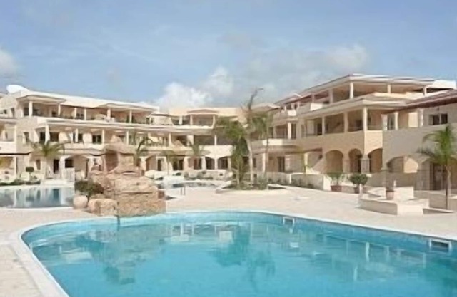 Large 3 bedroom apart. Internet, air-con, stunning balcony overlooking 2 pools