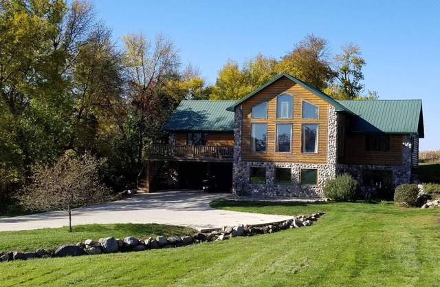 Large 3 Level Cabin located on 2 acres across the road from East Lake Okoboji