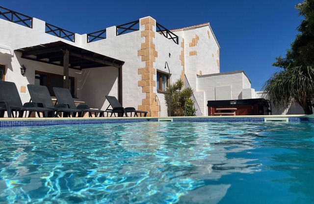 Large Home, Private Heated Pool and Hot-tub, In a Quiet Central Location