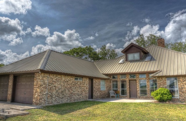 LARGE HOME ON THE BEAUTIFUL QUITE FRIO RIVER