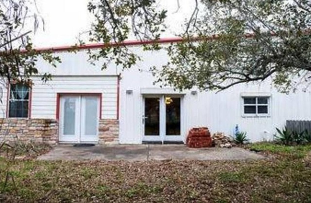 large home with lots of indoor and outdoor parking