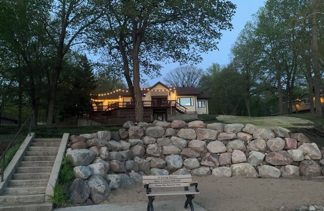 Large Lake House on 2.5 acres with 150 feet of shore front.