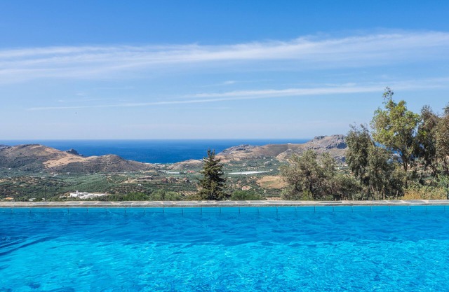Large modern villa situated on a hill in the traditional village of Marious.