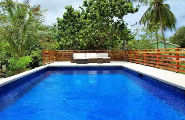 Large modern villa with pool on West Coast near beach & restaurants w/parking.