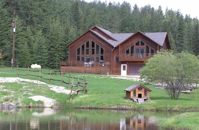 Large private lot. Beautiful cabin with a stream and trout pond!
