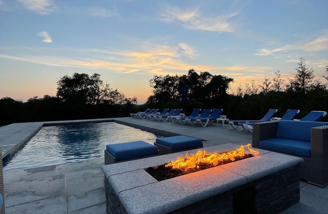 Large private property with new heated pool.Walk to town.