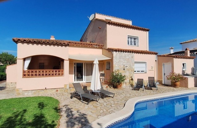 Large vacation home right on the beach with pool and garden