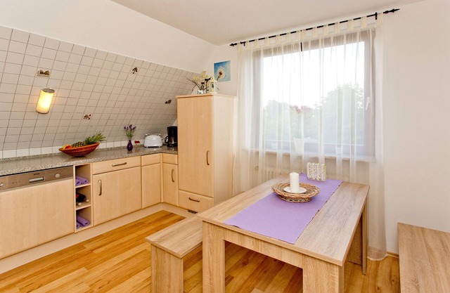 Large vacation apartment with balcony and view of the meadows and fields