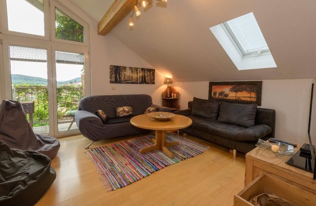 Large vacation apartment (105 sqm) with wood-burning stove and south-facing balcony