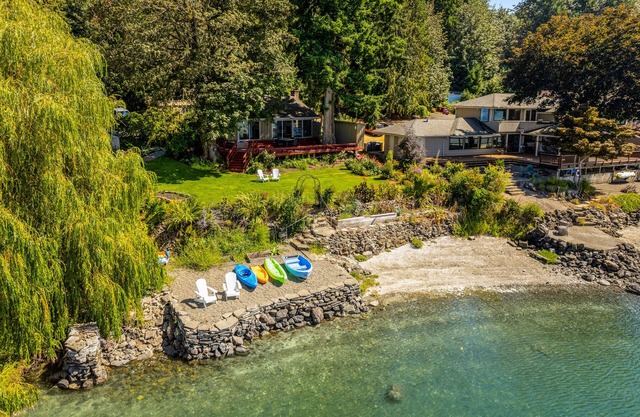 Large waterfront home with beach access, kayaks, & views - snowbird-friendly