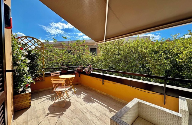 Like a small villa in Rome, independent with terrace and small private garden.
