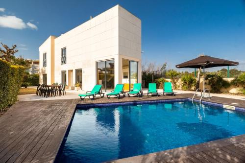 LINDA Oura Beach 4BR Villa 10 New for rent!