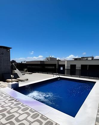 Lindo Flat a poucos passos da praia