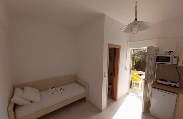 Litinas Apt with pool & balcony with garden view