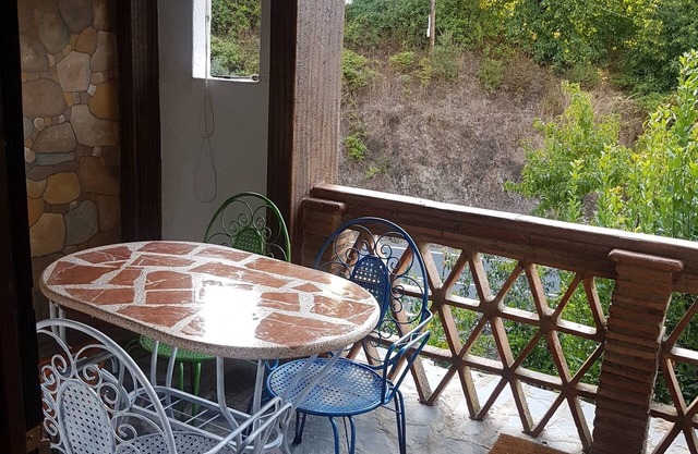 Little House With Fireplace And Terrace In Natural Environment