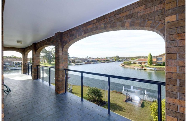 Live the Waterfront Dream in this Exquisite Family Home!