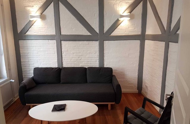 Located in the heart of Flensburg, in an alley next to the pedestrian zone