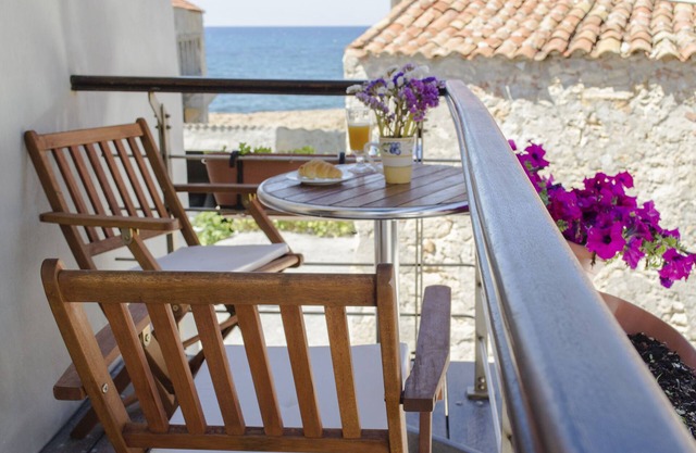 Loft Chania, at the water edge with view on the Cretan sea