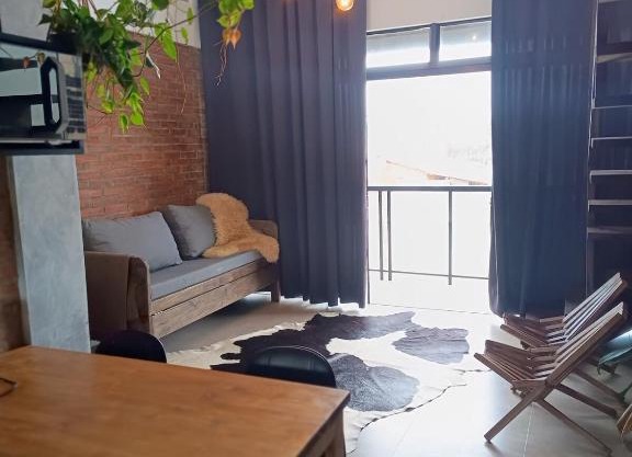 loft charmoso com lareira, a beira mar
