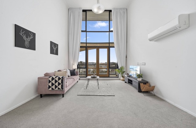 Loft-Style CBD 1-Bed with Rooftop Terrace & BBQ