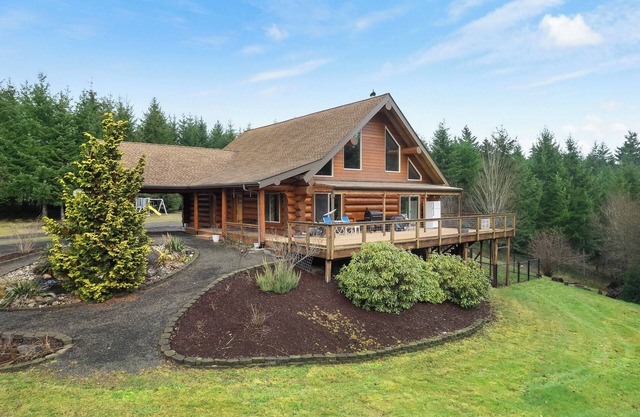 Log Cabin in the Woods. On five acre lot in the woods pet friendly.